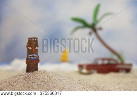 Tiki Statue On Tropical Beach With Vintage Hot Rod