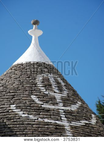 Primitivní Symbol na střeše Trullo