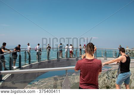 Biokovo, Croatia July 2020
Tourists Walking Accross The Newly Built Skywalk On Biokovo Mountain. Two