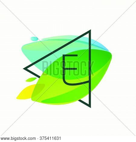E Letter Logo In Triangle Frame At Green Leaves Watercolor Background. Vector Ecology Typeface For B