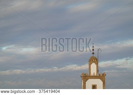 A Mosk Tower In A Blue Sky