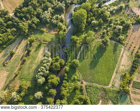 Aerial View Of Strumeshnitsa River Passing Through The Petrich Valley, Bulgaria