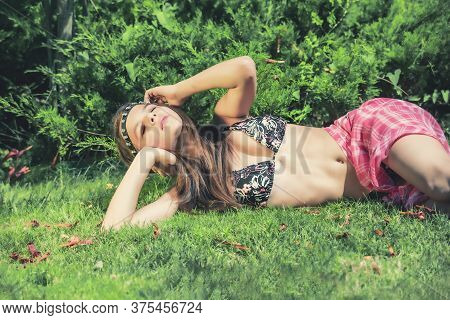 Portrait Of Beautiful Cute Brunette Teenager Model With Makeup, Poreo, In Summer Colorful Swimsuit P
