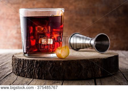 Boulevardier Cocktail And Orange Zest In Glass