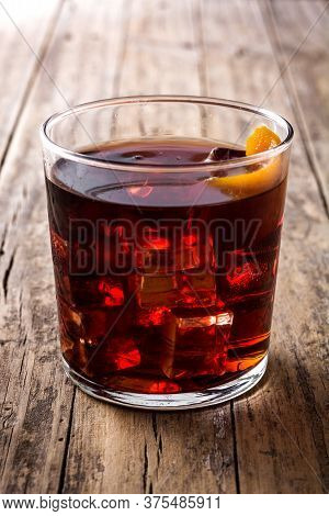 Boulevardier Cocktail And Orange Zest In Glass
