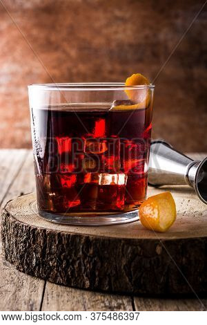 Boulevardier Cocktail And Orange Zest In Glass
