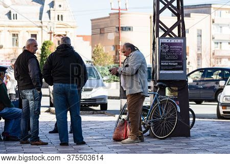 Group Of Old Men Talking In A Park In Lugoj, Romania, 2020