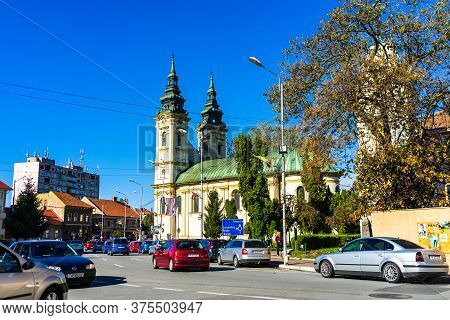 Cars In Traffic In Downtown Near Orthodox Church Of Lugoj, Romania, 2020