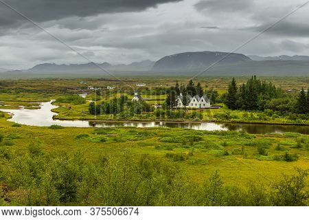 Thingvellir, Iceland- 22 August 2015: View Of The White Church And Surrounding Buildings In Thingvel