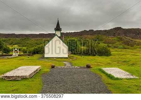 Thingvellir, Iceland- 22 August 2015: View Of The White Church And Surrounding Buildings In Thingvel
