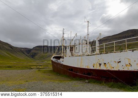 An Out-of-the-way Whaling Ship That Rusts On The Road To Látrabjarg On A Dead Cloudy Day. The Shipwr