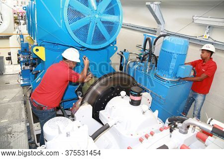 Simoes Fillho, Bahia / Brazil - May 13, 2015: Employee Is Seen Working At Acciona Windpower Wind Tur