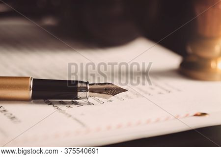 Law, Notary Background Theme. Fountain Pen And Handmade Paper On Desk