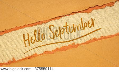 Hello September welcome note  - handwriting on a handmade rag paper