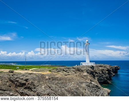 Summer Refreshing Blue Sky And Okinawa's Tourist Attractions, Cape Zanpa Lighthouse, Sea And Cliff