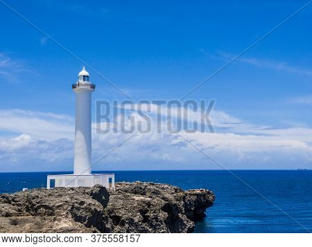 Summer Refreshing Blue Sky And Okinawa's Tourist Attractions, Cape Zanpa Lighthouse, Sea And Cliff
