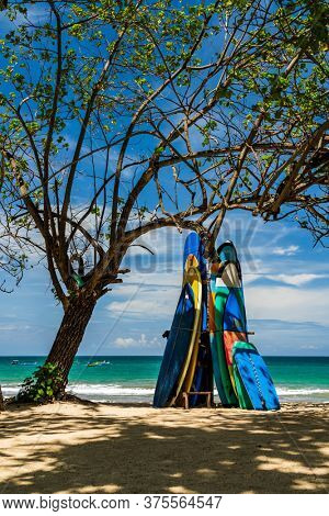 KUTA BALI - INDONESIA, FEBRUARY 7 : Surfboards on the famous beach of Kuta in Bali Indonesia February 7th, 2020