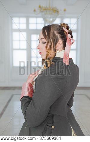 Beautiful Woman In Medieval Dress And Frock-coat