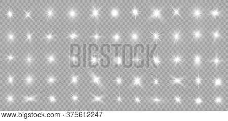 White Glowing Light Explodes On A Transparent Background. Sparkling Magical Dust Particles. Bright S