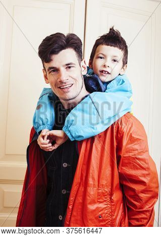 Faher And Son Together Having Fun At Home, Lifestyle Happy Family, People At Home
