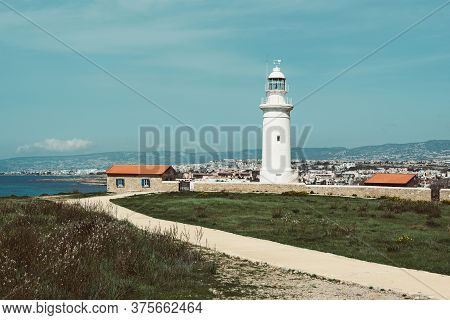 Ancient Ruins Of Kourion City Near Pathos And Limassol, Cyprus. Road To Lighthouse Under The Blue Sk