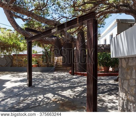 Three Bells In The Courtyard Of The Monastery Savvas On The Island Of Kalymnos