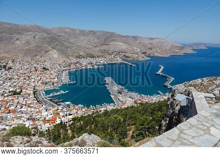 View Of Pothia Town, The Capital Of Kalymnos, Greece, From A Hill Above Pothia