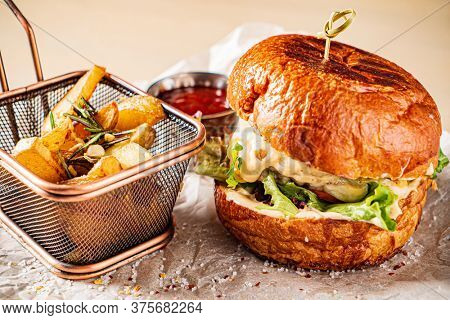 burger with tomato sauce and baked potato