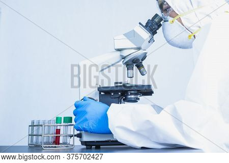 Doctors Wear A Face Shield / Ppe For Protection Against Coronavirus Disease. The Doctor Works Tirele
