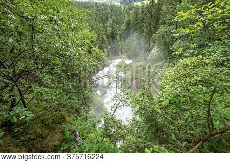 View Of The Schwarzbach River And Gollinger Waterfall From Above. Austria