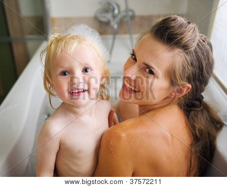 Portrait Of Mother And Baby Taking Bath