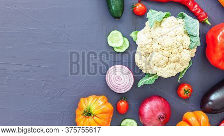 Healthy Food. Assortment Vegetables On Black Lilak Background. Top View. Copy Space. Composition Wit