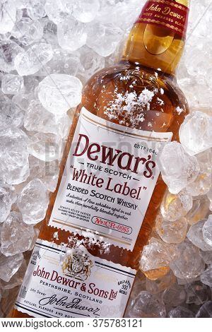 Bottle Of Dewars Blended Scotch Whisky In Crushed Ice
