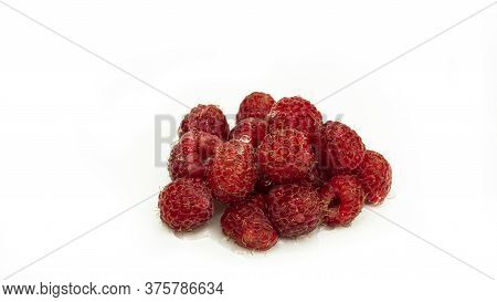 Fresh Raspberries On A White Background. Summer, Sweet Berry.