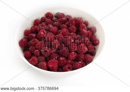 Fresh Raspberries With Water Drops In White Plate On A White Background. Summer, Sweet Berry.