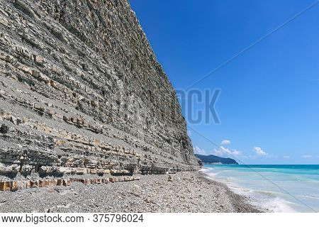 Beautiful Summer View Of The Rocks And Wild Beach In The Camp Sosnovka, On The Outskirts Of The Reso