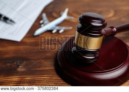The Concept Of Revoking A Flight License Next To A Judge Hammer.