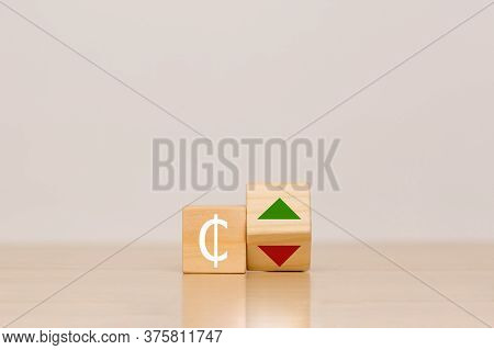 The Concept Of The Growth And Fall Of The Currency Of Ghana. Cedi Course. Currency Sign On Wooden Cu