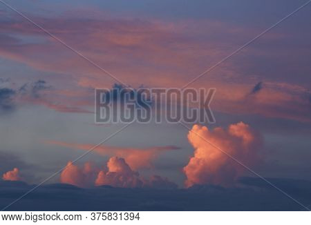 Dramatic Sunset Cloudscape With Multiple Layers Clouds.