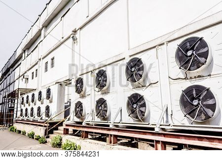 Air Conditioning Systems Mounted On An Exterior Supermarket Wall