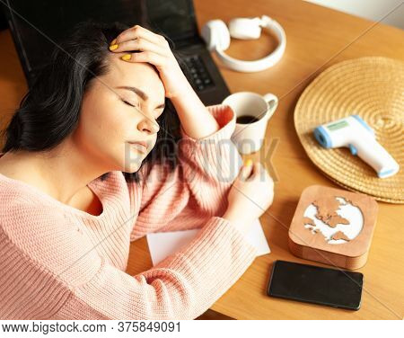 Young Woman Tired Of Work Migraine Stress