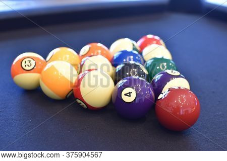 Black Billiard Table, Playing Snooker Pool 8Ball - Close-up Shot Of A Man Playing Billiard