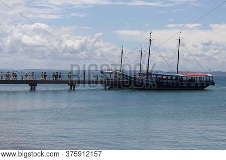 Salvador, Bahia / Brazil  - January 31, 2019: Passengers Are Seen At The Pier Of Ilha Dos Frades Sch