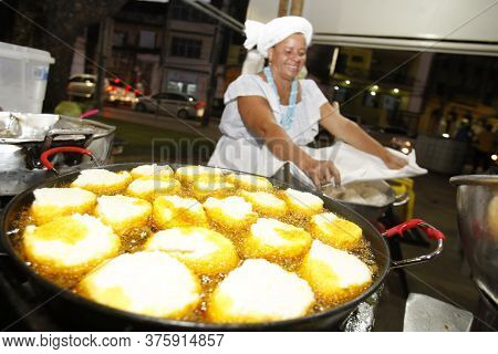 Salvador, Bahia / Brazil - May 9, 2016: Luciene Almeida, Acaraje Baiana Prepares Food In A Sales Tra