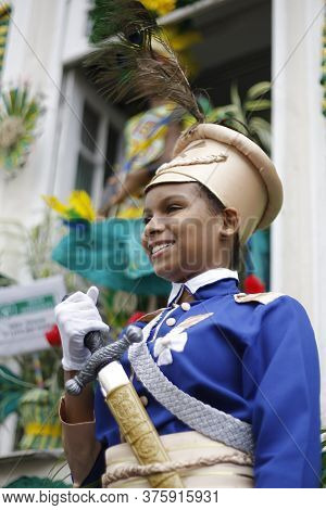 Salvador, Bahia / Brazil - July 2, 2015: Young Woman Wears Maria Quiteria's Costumes Is Seen In The 