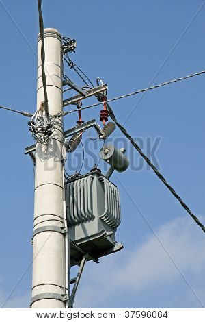 Electricity Transformer Mounted On A Pole For Electric Current