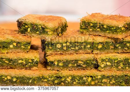 Close Up Of Traditional Oriental Sweet Pastry Cookies Known As Kanafeh, Turkish Desert With Sugar, H