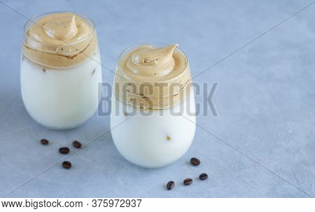 Cold Dalgon Coffee With Ice And Milk In Glasses. Trendy Whipped Korean Cuisine Coffee Drink
