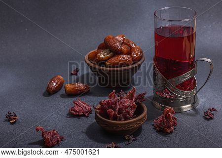 Hibiscus Hot Tea With Dates. Traditional Ramadan Kareem Concept Snack For Iftar Or Suhoor Meal