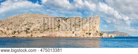 Summer Rocky Coastline And Military Base On Rock Top  (alchak Cape; Sudak Town Environs, Crimea, Ukr